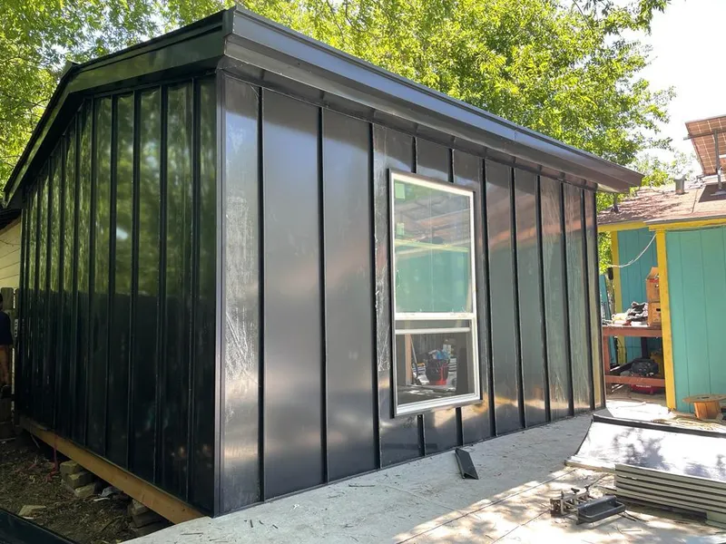 Black standing seam metal wall panels for Metal Roof Installation in Chesterton