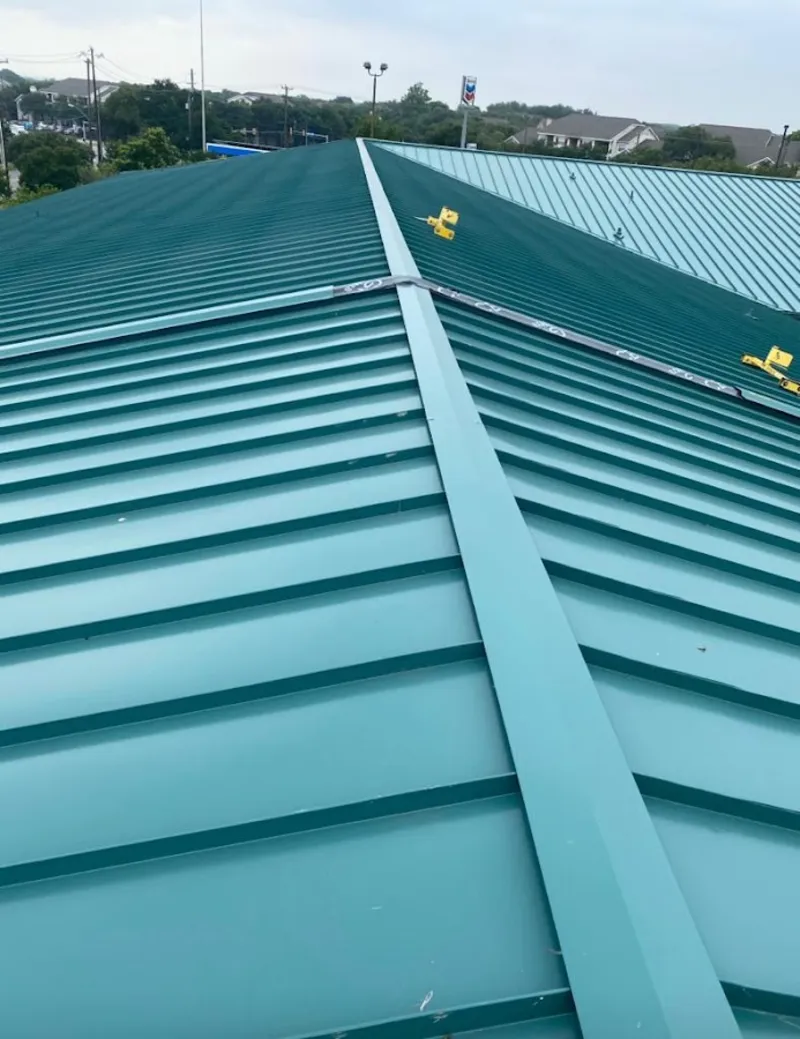 Green commercial metal roof ridge and valley for Metal Roof Repair in Chesterton