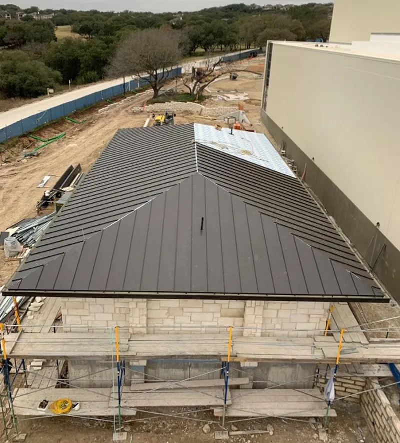 Metal roof new construction with scaffolding in Chesterton